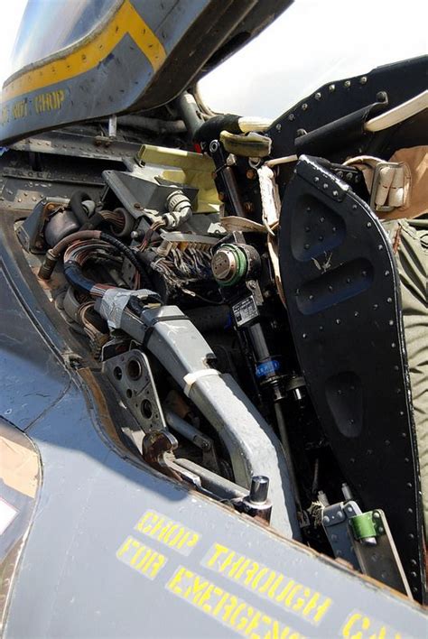 the inside of an airplane with its door open and parts in it's compartment