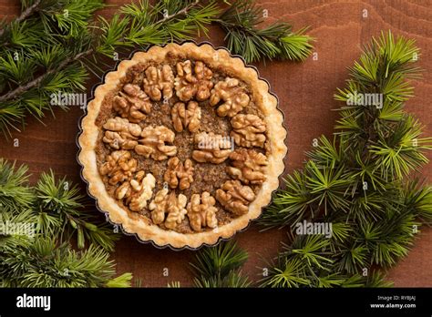 Almond And Nuts Tart With Pine Branches Stock Photo Alamy