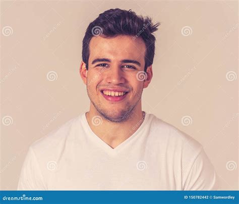 Portrait Of Attractive Cheerful Young Man With Smiling Happy Face