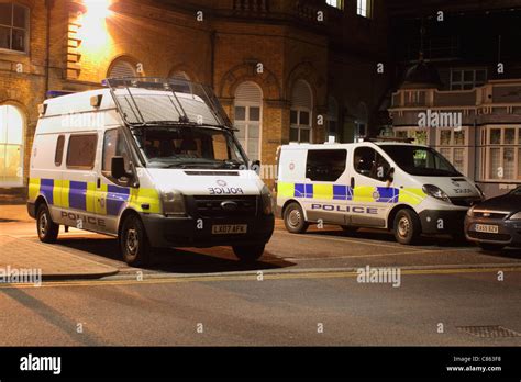 Police Car Uk Riot Van With Wire Mesh Windscreen Guard Stock Photo