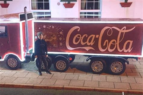 Watch: Beautiful replica Coke Christmas Truck is pulling the crowds ...