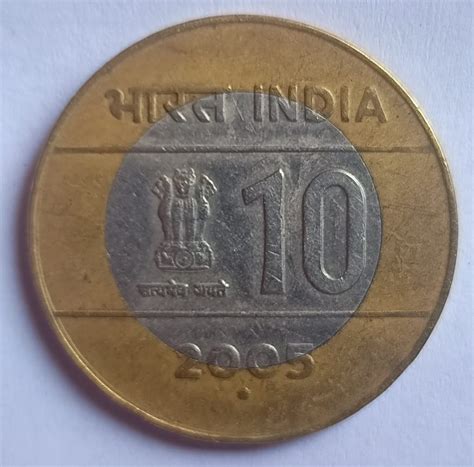 10 rs coin 2005 with cross sign - BidCurios