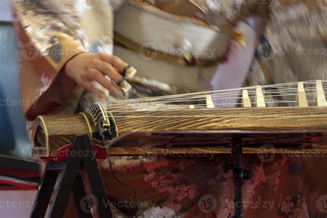 Koto japanese harp 20249664 Stock Photo at Vecteezy