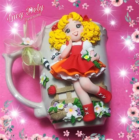 A Ceramic Mug With A Girl Sitting On It S Side And Flowers Around The Edge