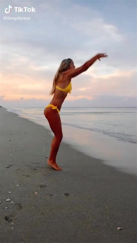 Erotic Olivia Dunne In Yellow Bikini At The Beach While Doing Fitness