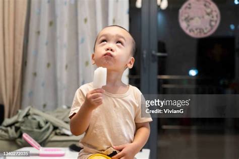 Baby Eating Popsicle Photos And Premium High Res Pictures Getty Images