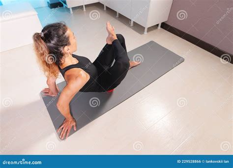 Athletic Caucasian Slim Woman Doing Myofascial Self Massage Of The