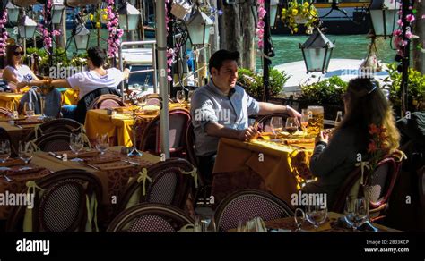 Restaurant on the Grand Canal in Venice Stock Photo - Alamy