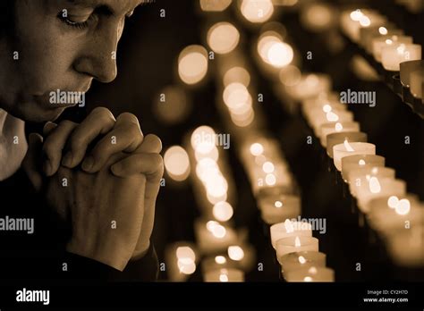 Woman Praying In Church Stock Photo Alamy