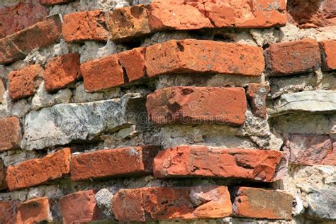 Old Crumbling Masonry Wall With Red Bricks And Stones Old Red Brick