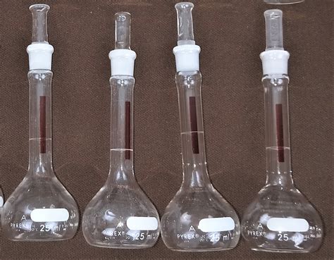 Used Corning Pyrex Lifetime Red Volumetric Flask With Glass