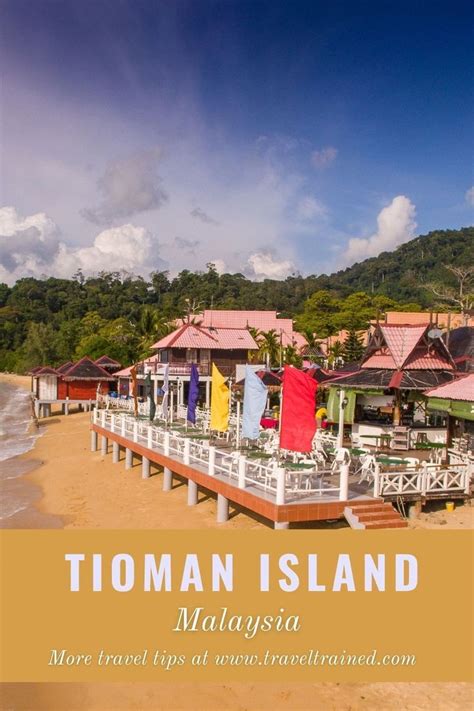 An Image Of A Beach With Houses On It And The Words Tioman Island Malaysia