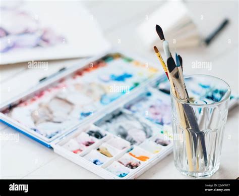 painting hobby watercolor palette paintbrushes Stock Photo - Alamy