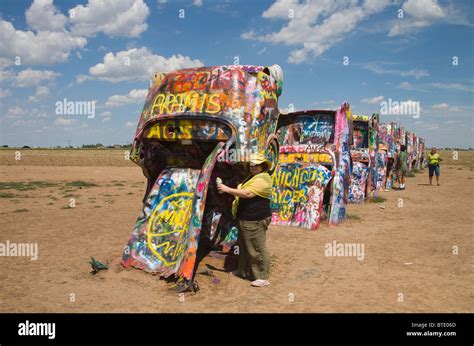 graffiti covered cars at the cadillac ranch amarillo texas Stock Photo ...