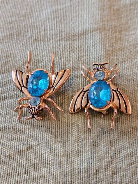 Vintage Signed Pair Pegasus Coro Gold Tone Blue Rhine Gem