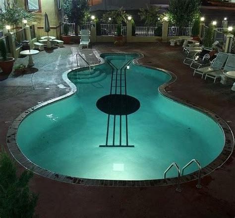 Guitar shaped pool | Dream pools, Pool, Cool pools