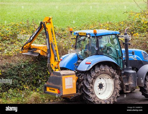 Tractor Cutting Hedges Hi Res Stock Photography And Images Alamy