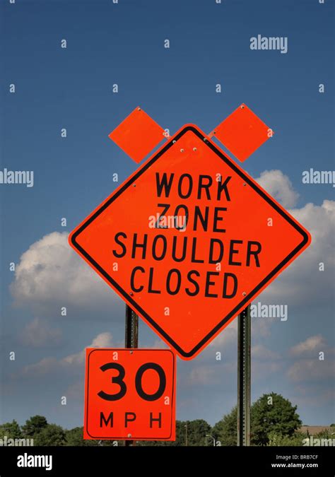 road construction sign orange work zone shoulder closed speed limit ...