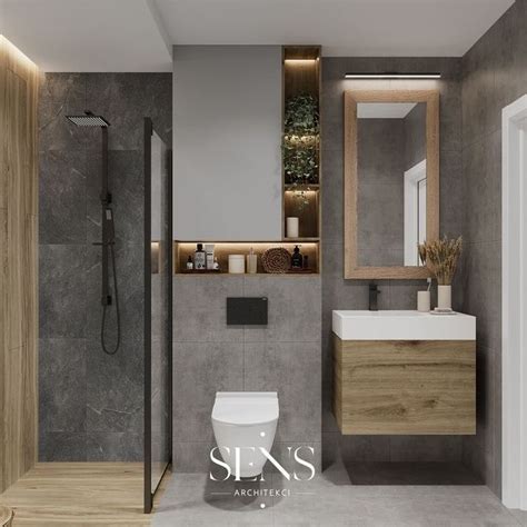 A Bathroom With A Toilet Sink And Shower In Grey Colors On The Walls