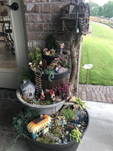 A Potted Planter Filled With Lots Of Different Types Of Plants And