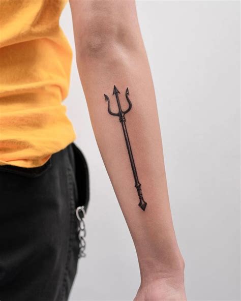 Pin on Tattoos in 2024 | Trident tattoo, Rebel tattoo, Hand tattoos