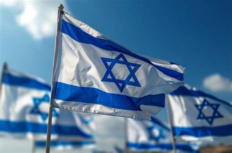 Premium Photo | Israeli flags waving against blue sky