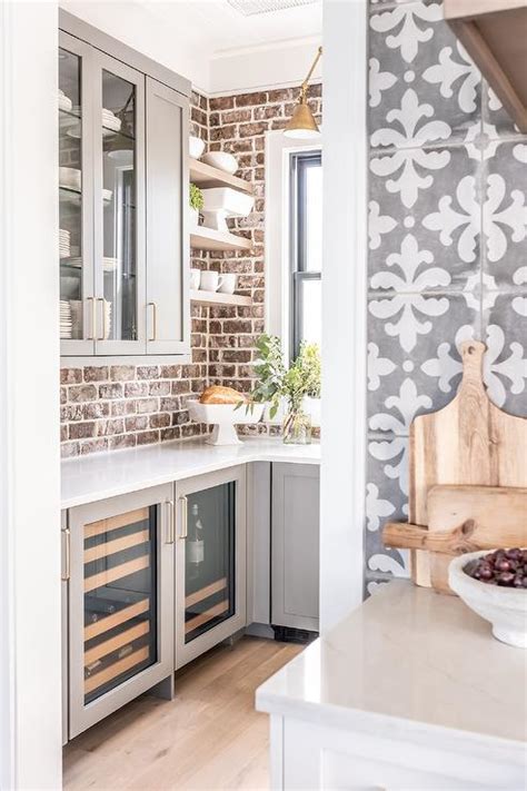 Gray Pantry Cabinets With Red Brick Backsplash Cottage Kitchen