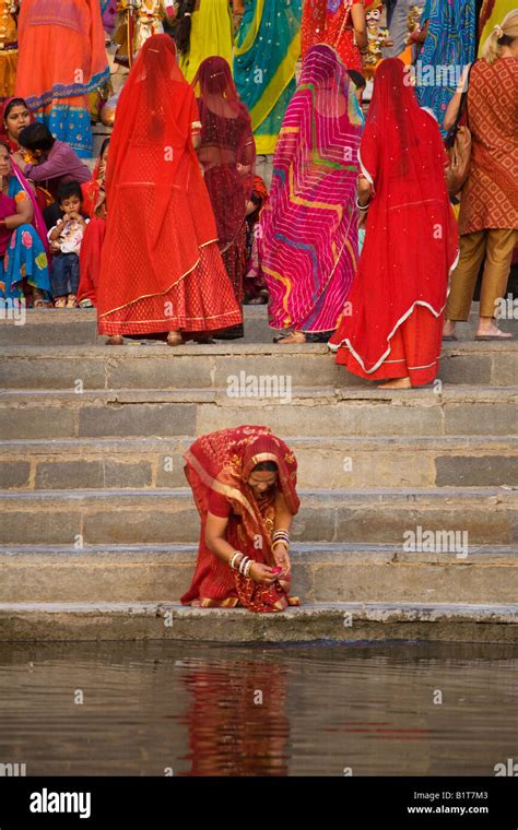 Rajasthani Women Gather At The Gangaur Ghat On The Shore Of Pichola Lake For The Gangaur