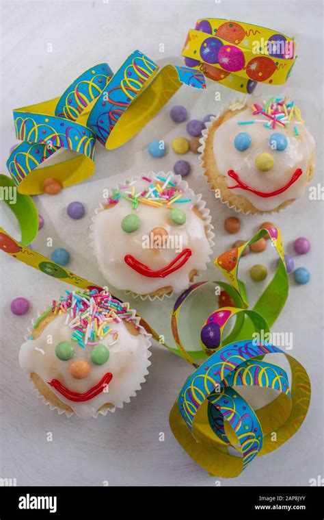 Carnival Clown Muffins Decorated With Multi Colored Chocolate Lentils