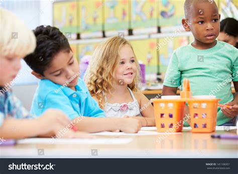 group elementary age children art class stock photo