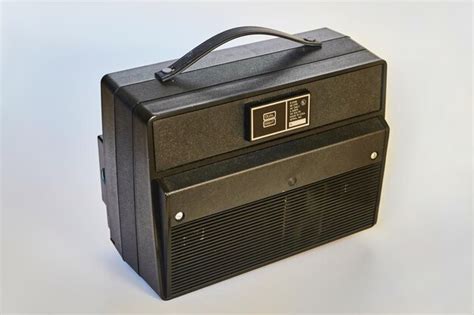 premium photo vintage portable black radio closeup  light background