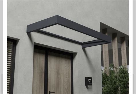 Козырек над входом в гараж - 60 фото