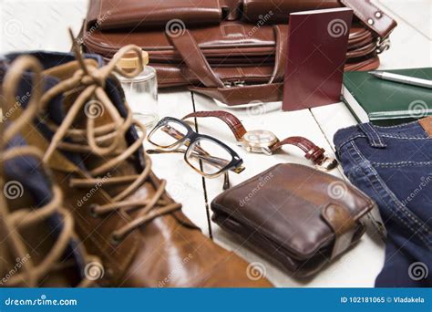 Men S Casual Outfits With Leather Accessories On White Rustic Wo Stock