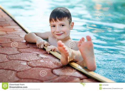 Little Boy With Sole Up In The Pool Stock Photo Image 32762380