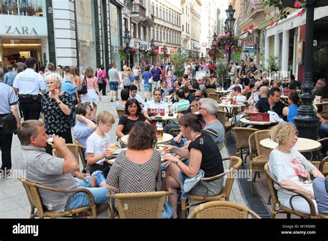 BUDAPEST, HUNGARY - JUNE 19, 2014: People visit Vaci Street in Budapest ...