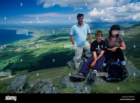 Family on summit of Gyrn Goch Caernarfon North Wales Stock Photo - Alamy