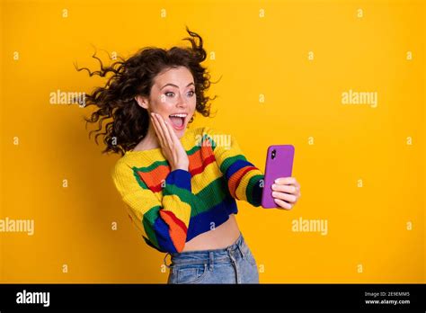 Photo Of Positive Nice Curly Brunette Hairdo Girl Do Selfie Wear Short Pullover Isolated Over