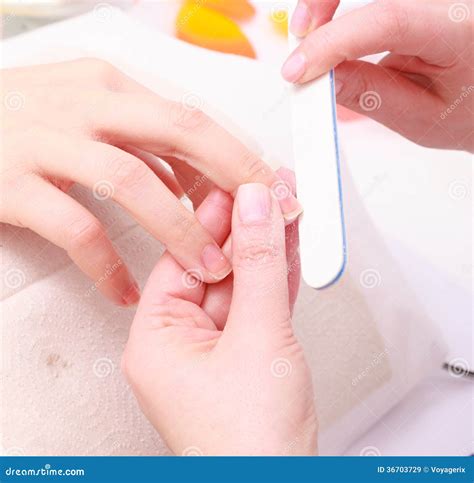 Beautician With File Filing Nails Female Client Stock Image Image Of