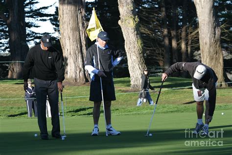 Caddy and Tiger Woods Photograph by Chuck Kuhn - Fine Art America