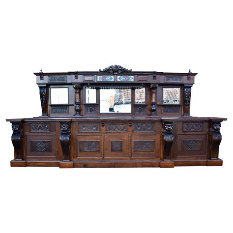 19th Century English Victorian Carved Oak Front And Back Bar For Sale