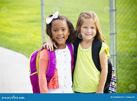 Two Little Kids Going To School Together Stock Photo Image Of Girl