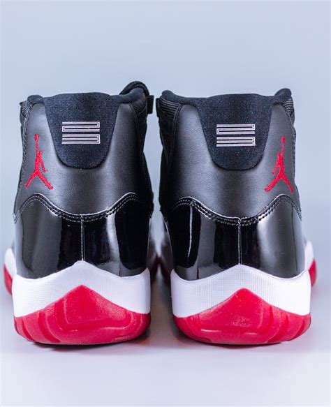 Air jordan 11 retro low black red white · Free Stock Photo