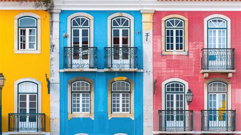 Colorful Buildings Of Lisbon Historic Center Near Landmark Rossio