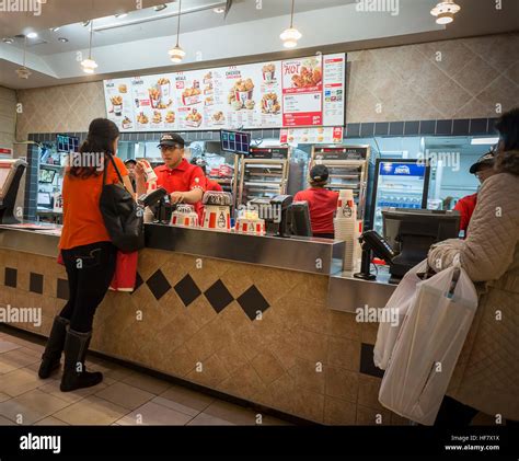 A KFC franchise restaurant in the food court of the Queens Center Mall ...