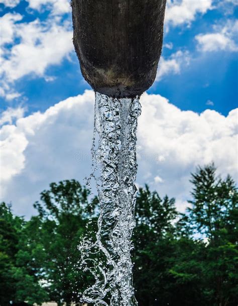 Fresh And Clean Spring Water Descends From The Blue Sky Stock Image