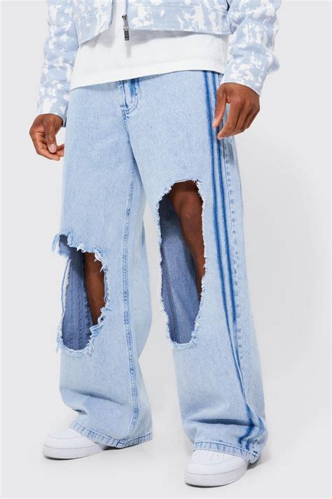 Relaxed Rigid Tape Detail Exploded Knee Jeans Boohoo Uk