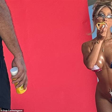 Doja Cat Shows Off Her Figure In Bikini While Drinking A Bud Light