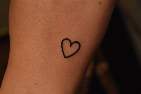 Minimalistic Heart Tattoo Located On The Wrist