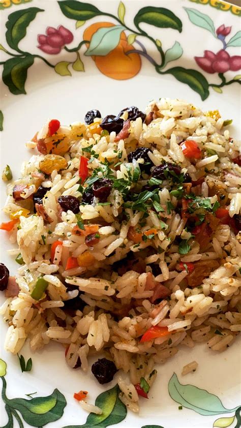 A Plate With Rice And Beans On It