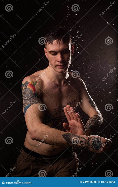 Handsome Healthy Tattooed Man With Water Drops On His Body Fitness Man Naked Torso With Tattoos